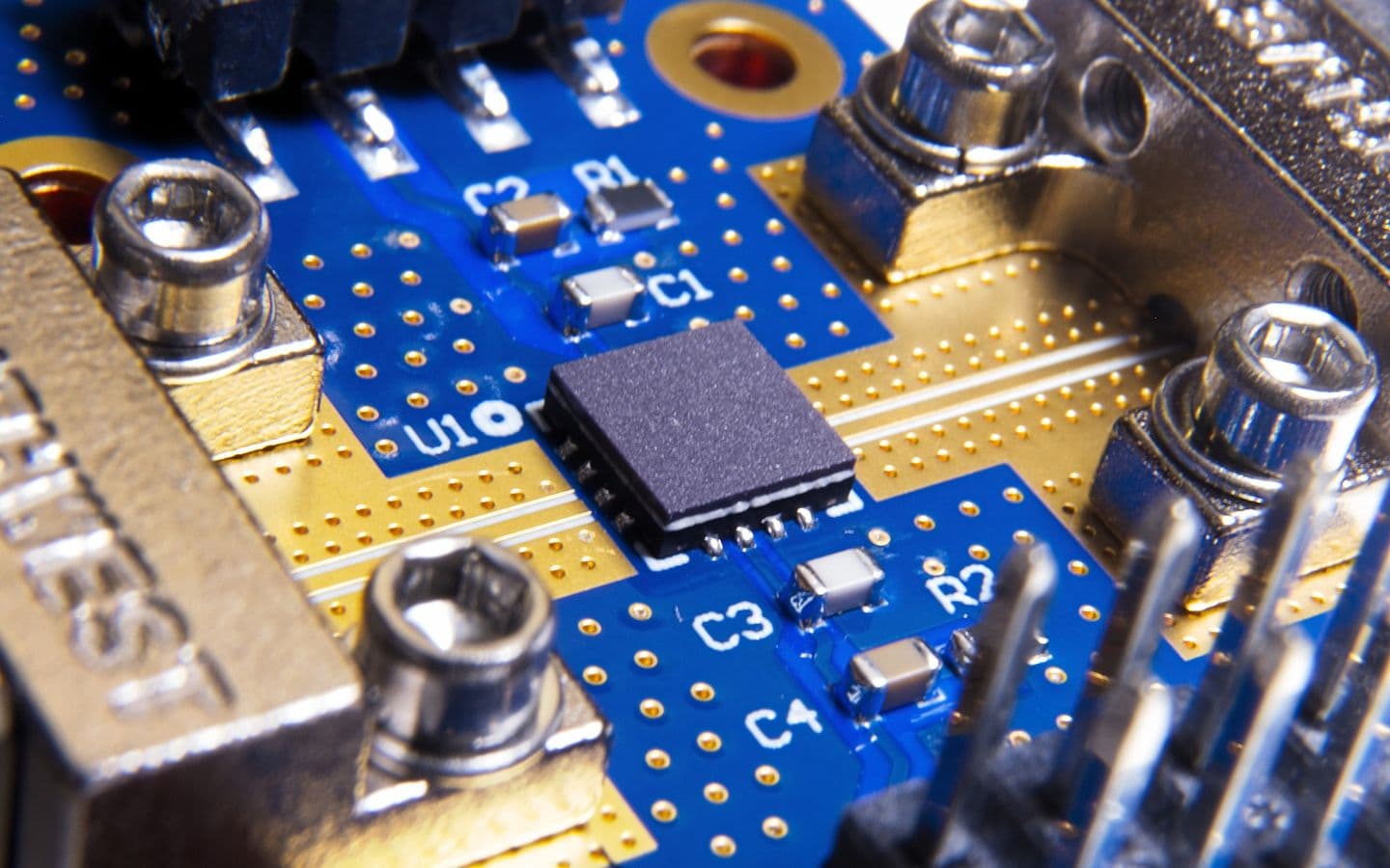 Macro photograph of a Falcomm Dual-Drive die seated on an evaluation board