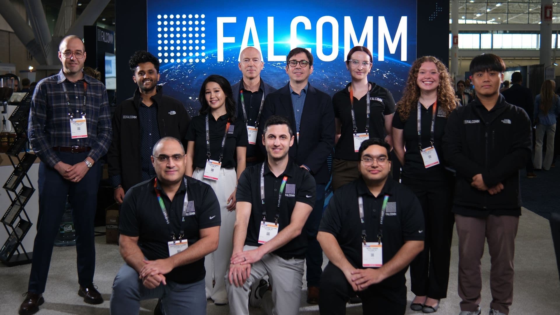 The Falcomm team at their IMS 2026 booth in Boston